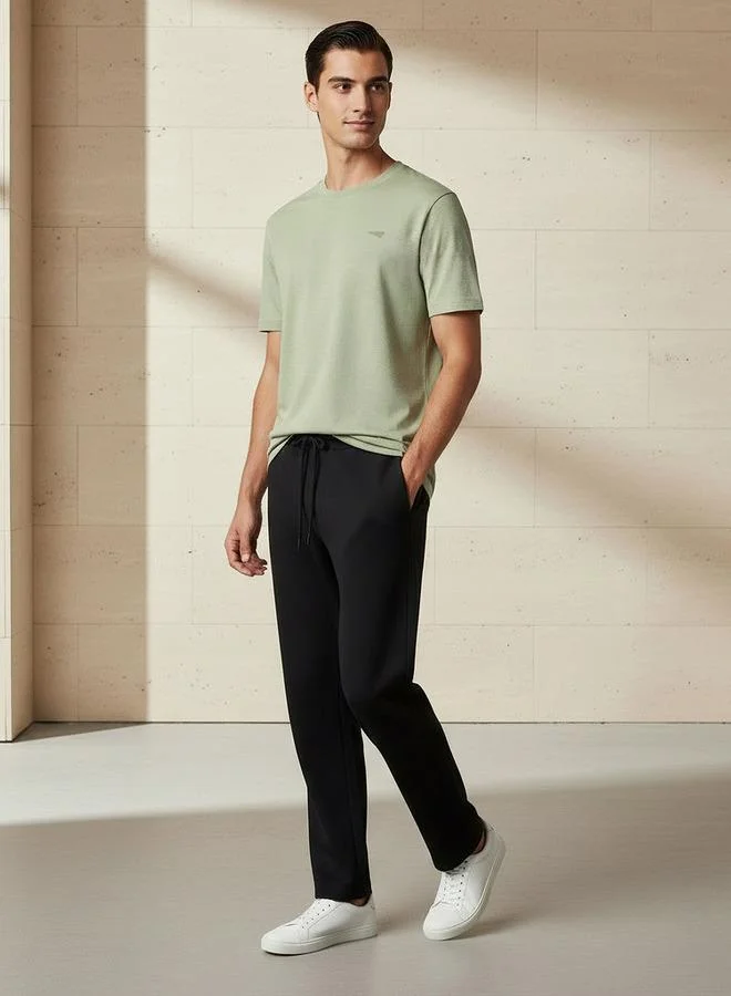 لي كوبر Lee Cooper Men Regular Fit Crew Neck Short Sleeves Badge Detail T-shirt